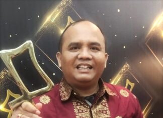 Ramses Simanullang, S.E., M.Si Aktivis Gereja yang Kini Komisioner KPID Sumut